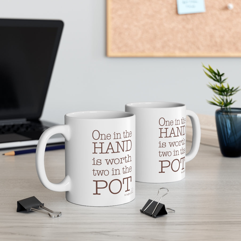 One in the hand is worth two in the pot Ceramic Mug 11oz